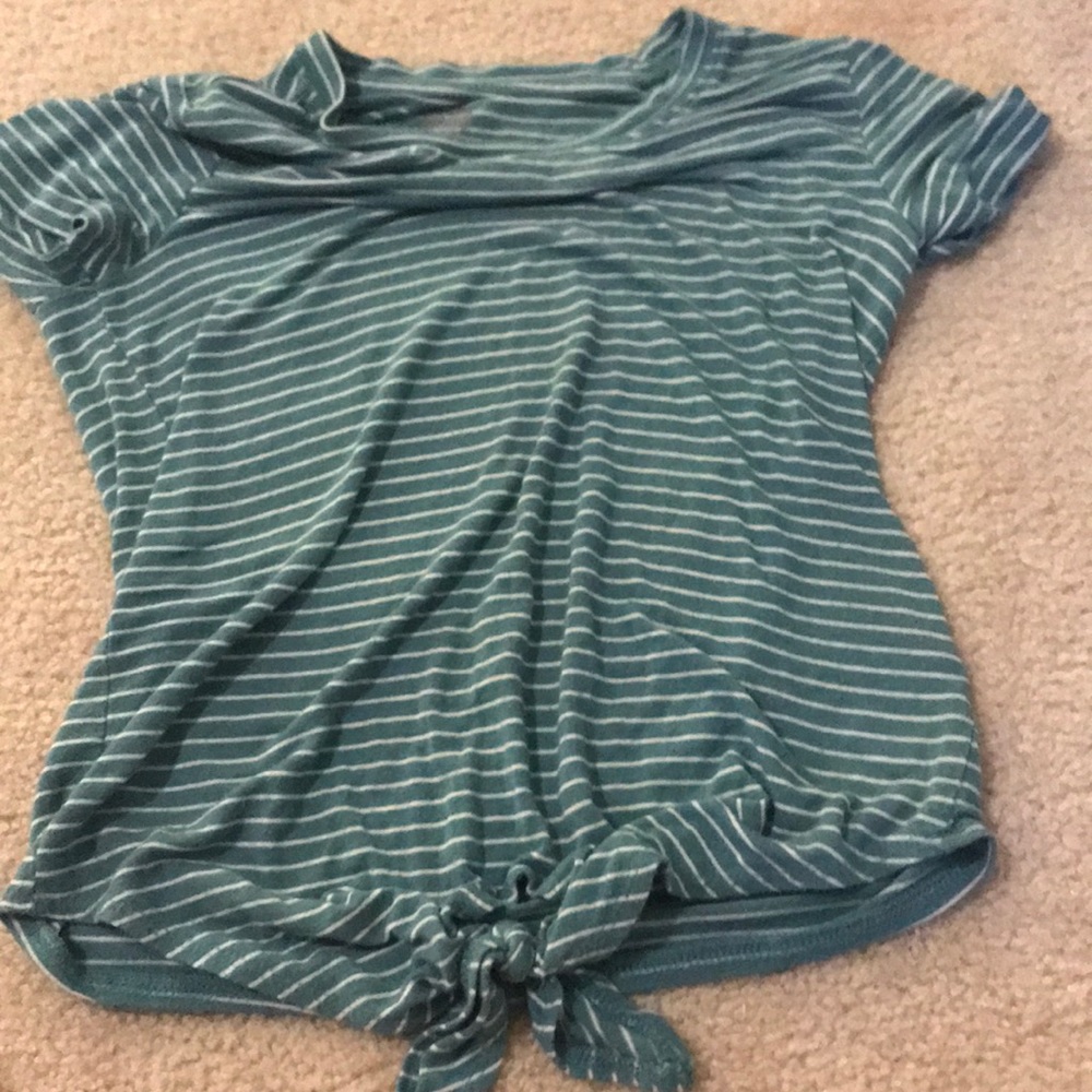 Green and white striped shirt with tie at bottom